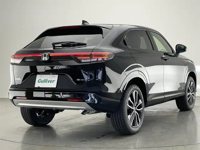ホンダ ヴェゼル ハイブリッド e:HEV Z 愛知県 2025(令7)年 0.1千km クリスタルブラックパール 登録済未使用車　純正９型ＤＡ　ＢＳＭ　黒ハーフレザー　追従クルコン　フルセグ　ＥＴＣ　パドルシフト　ホンダセンシング　ステアリングヒーター　シートヒーター　衝突軽減　ワイヤレス充電　ＬＥＤライト　禁煙　USB　フォグ　コーナーセンサー　オートハイビーム　プッシュスタート　スマートキー　誤発進抑制　レーンキープ