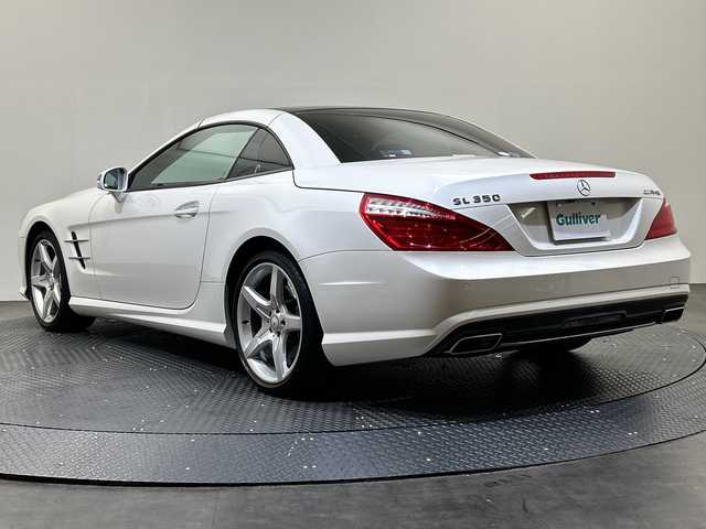 メルセデス・ベンツ ＳＬ３５０ 愛媛県 2013(平25)年 6.5万km ダイヤモンドホワイト 純正ナビ/ワンセグ／Ｂｌｕｅｔｏｏｔｈ／ＣＤ／ＵＳＢ/バックカメラ/サンルーフ/衝突軽減ブレーキ/レーンキープアシスト/ブラインドスポットモニター/ＬＥＤヘッドライト/ＤＮ席パワーシート/DN席シートヒーター/アテンションアシスト