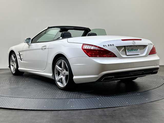 メルセデス・ベンツ ＳＬ３５０ 愛媛県 2013(平25)年 6.5万km ダイヤモンドホワイト 純正ナビ/ワンセグ／Ｂｌｕｅｔｏｏｔｈ／ＣＤ／ＵＳＢ/バックカメラ/サンルーフ/衝突軽減ブレーキ/レーンキープアシスト/ブラインドスポットモニター/ＬＥＤヘッドライト/ＤＮ席パワーシート/DN席シートヒーター/アテンションアシスト
