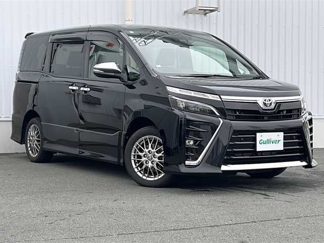 トヨタ ヴォクシー ハイブリッド ZS 煌Ⅲ 三重県 2021(令3)年 5万km ブラック 純正10型ナビ /純正後席モニター /バックカメラ /ビルトインETC /前後ドライブレコーダー/コーナーセンサー /前席シートヒーター /両側パワースライドドア/クルーズコントロール/レーンキープアシスト/衝突軽減ブレーキ/革巻きステアリング/ステアリングスイッチ/USB給電 /ウォークスルー /純正フロアマット/LEDヘッドライト/オートハイビーム /スペアキー /電動格納ミラー/禁煙車