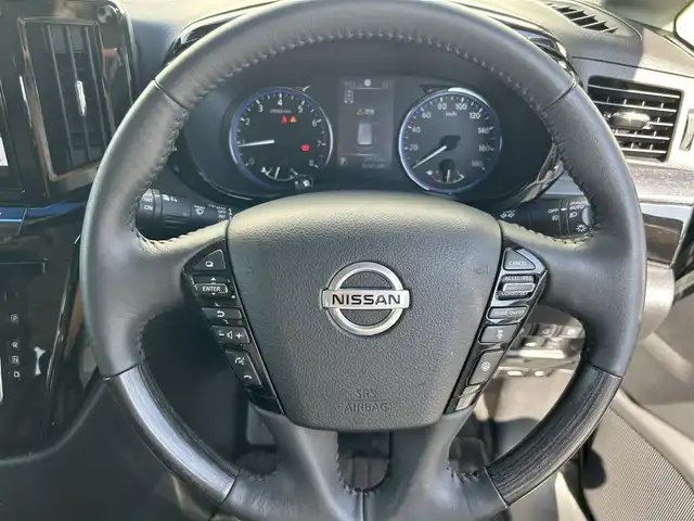日産 エルグランド 250HWS プレミアム アーバンクロム 福岡県 2022(令4)年 2.7万km 黒 純正10型SDナビ(フルセグTV/CD/DVD/BT)アラウンドビューカメラフリップダウンモニターブラインドスポットコーナーセンサー電動パワスラクルコンドラレコETCデジタルインナーミラーシートヒーターUSB冷蔵庫純正フロアマット純正LED純正アルミホイールプッシュスタートスマートキー