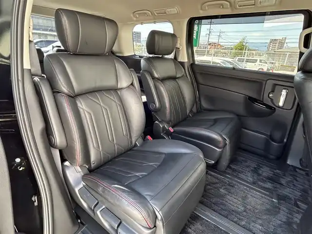 日産 エルグランド 250HWS プレミアム アーバンクロム 福岡県 2022(令4)年 2.7万km 黒 純正10型SDナビ(フルセグTV/CD/DVD/BT)アラウンドビューカメラフリップダウンモニターブラインドスポットコーナーセンサー電動パワスラクルコンドラレコETCデジタルインナーミラーシートヒーターUSB冷蔵庫純正フロアマット純正LED純正アルミホイールプッシュスタートスマートキー