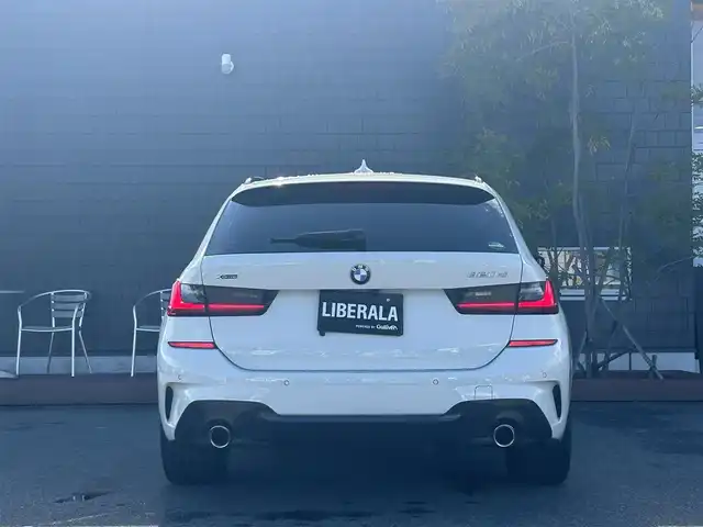 ＢＭＷ ３２０ｄ xDrive ツーリング Mスポーツ 滋賀県 2021(令3)年 2.6万km 白 クルーズコントロール（追従アリ）/BTオーディオ/ナビ/全方位カメラ/USB入力端子/ETC2.0/ドライブレコーダー/茶レザーシート/パワーシート（D/N）/シートヒーター（D/N）/メモリー付パワーシート（D）/LEDヘッドライト/オートライト/パワーテールゲート/純正フロアマット/純正アルミ