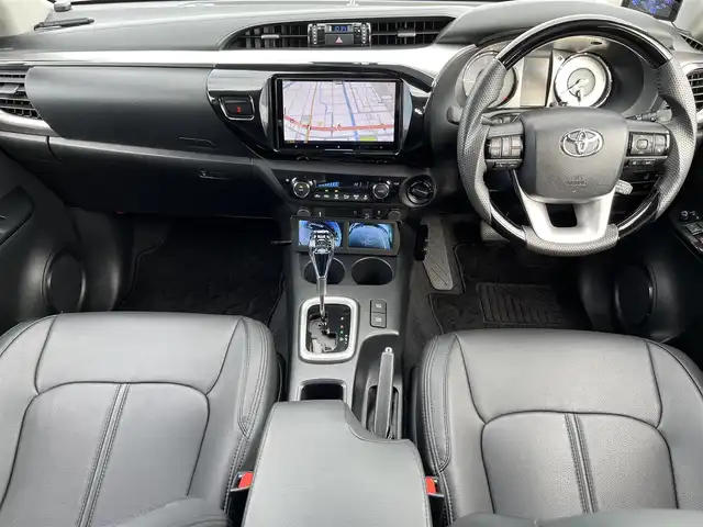 トヨタ ハイラックス Z 鳥取県 2021(令3)年 2.7万km アティチュードブラックマイカ ４WD　ターボ車/社外9型ナビ/フルセグ/DVD/CD/BT/USB/フロント/サイド/バックカメラ/前後ドライブレコ＾ダー・ETC/２インチリフトアップ/フロントバンパーガード/GIギアサイドステップ/SUXONサイドに本出しマフラー/GRハードトノカバー/純正荷台内カバー/TRD　GRマットフラップ/RAYS１７インチアルミホイール/Monstaホワイトレターブロックタイヤ/社外オーバーフェンダー/リヤヒッチメンバー/レザー調シートカバー/社外コンビハンドル・社外シフトノブ/トヨタセーフティセンス/レーダークルーズコントロール/レーンキープアシスト/LEDヘットライト/プッシュエンジンスタート/フロアマット/ドアバイザー/保証書・取扱説明書