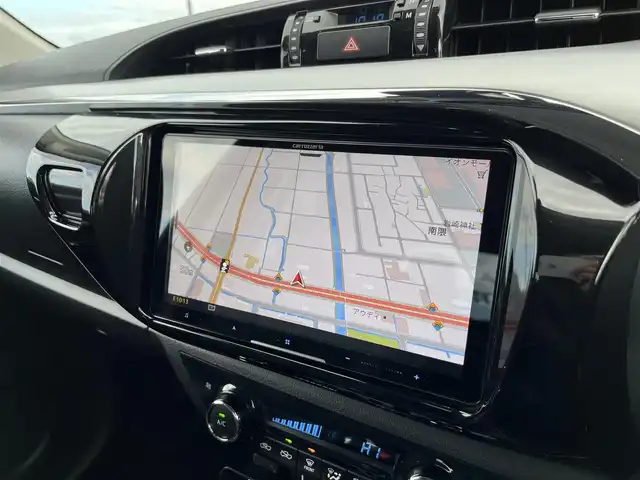 トヨタ ハイラックス Z 鳥取県 2021(令3)年 2.7万km アティチュードブラックマイカ ４WD　ターボ車/社外9型ナビ/フルセグ/DVD/CD/BT/USB/フロント/サイド/バックカメラ/前後ドライブレコ＾ダー・ETC/２インチリフトアップ/フロントバンパーガード/GIギアサイドステップ/SUXONサイドに本出しマフラー/GRハードトノカバー/純正荷台内カバー/TRD　GRマットフラップ/RAYS１７インチアルミホイール/Monstaホワイトレターブロックタイヤ/社外オーバーフェンダー/リヤヒッチメンバー/レザー調シートカバー/社外コンビハンドル・社外シフトノブ/トヨタセーフティセンス/レーダークルーズコントロール/レーンキープアシスト/LEDヘットライト/プッシュエンジンスタート/フロアマット/ドアバイザー/保証書・取扱説明書