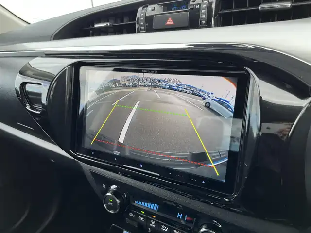 トヨタ ハイラックス Z 鳥取県 2021(令3)年 2.7万km アティチュードブラックマイカ ４WD　ターボ車/社外9型ナビ/フルセグ/DVD/CD/BT/USB/フロント/サイド/バックカメラ/前後ドライブレコ＾ダー・ETC/２インチリフトアップ/フロントバンパーガード/GIギアサイドステップ/SUXONサイドに本出しマフラー/GRハードトノカバー/純正荷台内カバー/TRD　GRマットフラップ/RAYS１７インチアルミホイール/Monstaホワイトレターブロックタイヤ/社外オーバーフェンダー/リヤヒッチメンバー/レザー調シートカバー/社外コンビハンドル・社外シフトノブ/トヨタセーフティセンス/レーダークルーズコントロール/レーンキープアシスト/LEDヘットライト/プッシュエンジンスタート/フロアマット/ドアバイザー/保証書・取扱説明書