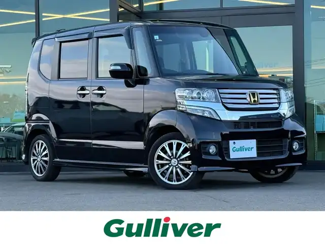 ホンダ Ｎ ＢＯＸ カスタム ターボ SSパッケージ 東京都 2015(平27)年 3.4万km プレミアムゴールドパープルパール 社外HDDナビ　/・ＦＭ／ＡＭ／ＣＤ／ＤＶＤ/・フルセグＴＶ／Ｂｌｕｅｔｏｏｔｈ　/両側パワースライドドア　/ＥＴＣ　/バックカメラ　/アイドリングストップ/革巻ステアリング/ステアリングスイッチ/エンジンスタートボタン/スマートキー/純正15インチアルミホイール/純正フロアマット/オートライト/オートエアコン