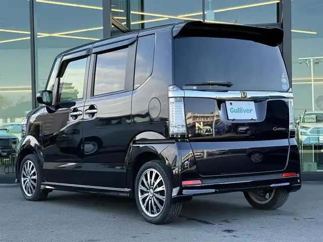 ホンダ Ｎ ＢＯＸ カスタム ターボ SSパッケージ 東京都 2015(平27)年 3.4万km プレミアムゴールドパープルパール 社外HDDナビ　/・ＦＭ／ＡＭ／ＣＤ／ＤＶＤ/・フルセグＴＶ／Ｂｌｕｅｔｏｏｔｈ　/両側パワースライドドア　/ＥＴＣ　/バックカメラ　/アイドリングストップ/革巻ステアリング/ステアリングスイッチ/エンジンスタートボタン/スマートキー/純正15インチアルミホイール/純正フロアマット/オートライト/オートエアコン