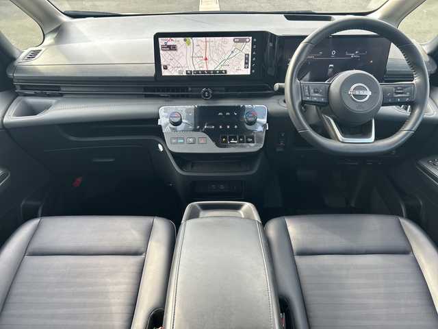 日産 セレナ e－パワー ルキシオン 福岡県 2023(令5)年 1.4万km プリズムホワイト ワンオーナー/プロパイロット2.0/純正フリップダウンモニター/純正フロントマスク/純正ナビ/（BT/フルセグ/AM/FM/USB/HDMI/AｐｐleCarPlay)/アラウンドビューモニター/Bカメラ/フロントカメラ/サイドカメラ/両側パワースライドドア/レーダークルーズコントロール/LEDヘッドライト/オートライト/オートマチックハイビーム/合皮シート/シートヒーター/ステアリングヒーター/ステアリングスイッチ/純正16インチAW/デジタルインナーミラー/HUD/電動パーキングブレーキ/置くだけ充電/ePedal/パーキングアシスト/横滑り防止装置/コーナーセンサー/レーンキープアシスト/盗難防止装置/衝突被害軽減システム/ウィンカーミラー/リアサンシェード/スマートキー/ETC2.0/保証書/取扱説明書