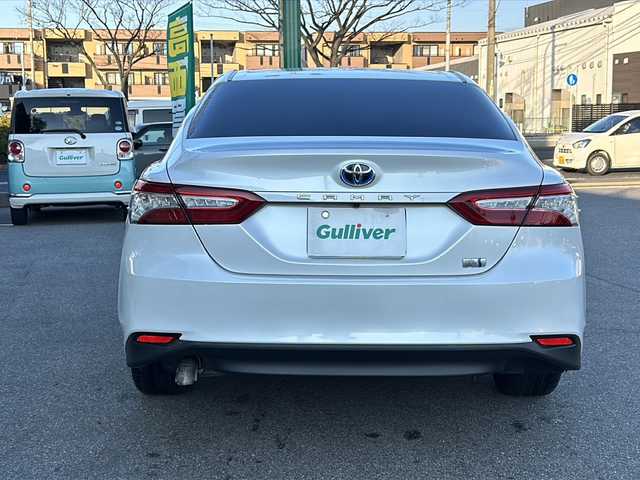 トヨタ カムリ G 鳥取県 2018(平30)年 9.9万km プラチナホワイトパールマイカ レーダークルーズコントロール/ＳＤナビ/バックカメラ/フルセグＴＶ　ＤＶＤ　ＣＤ　Ｂｌｕｅｔｏｏｔｈ/ビルトインＥＴＣ/ＭＴモード付ＡＴ/前後ドライブレコーダー/運転席パワーシート/オートホールド/オートハイビーム/オートライト/レーンアシスト/社外レーダー/ＬＥＤライト/フォグランプ/スマートキー/スペアキー/新車保証書/取扱説明書