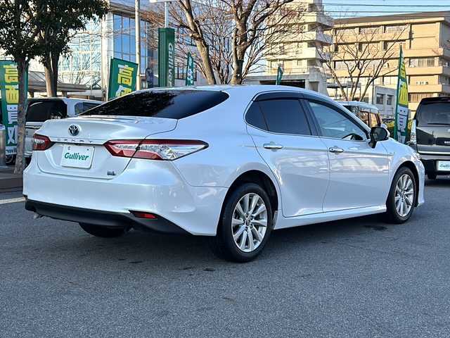 トヨタ カムリ G 鳥取県 2018(平30)年 9.9万km プラチナホワイトパールマイカ レーダークルーズコントロール/ＳＤナビ/バックカメラ/フルセグＴＶ　ＤＶＤ　ＣＤ　Ｂｌｕｅｔｏｏｔｈ/ビルトインＥＴＣ/ＭＴモード付ＡＴ/前後ドライブレコーダー/運転席パワーシート/オートホールド/オートハイビーム/オートライト/レーンアシスト/社外レーダー/ＬＥＤライト/フォグランプ/スマートキー/スペアキー/新車保証書/取扱説明書