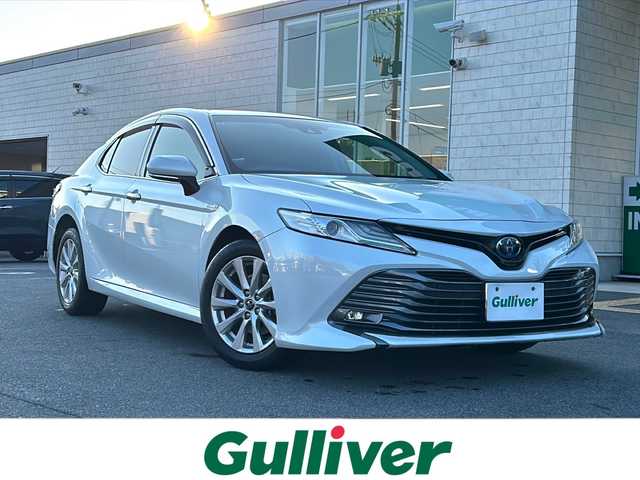 トヨタ カムリ G 鳥取県 2018(平30)年 9.9万km プラチナホワイトパールマイカ レーダークルーズコントロール/ＳＤナビ/バックカメラ/フルセグＴＶ　ＤＶＤ　ＣＤ　Ｂｌｕｅｔｏｏｔｈ/ビルトインＥＴＣ/ＭＴモード付ＡＴ/前後ドライブレコーダー/運転席パワーシート/オートホールド/オートハイビーム/オートライト/レーンアシスト/社外レーダー/ＬＥＤライト/フォグランプ/スマートキー/スペアキー/新車保証書/取扱説明書