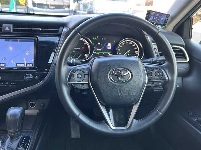 トヨタ カムリ G 鳥取県 2018(平30)年 9.9万km プラチナホワイトパールマイカ レーダークルーズコントロール/ＳＤナビ/バックカメラ/フルセグＴＶ　ＤＶＤ　ＣＤ　Ｂｌｕｅｔｏｏｔｈ/ビルトインＥＴＣ/ＭＴモード付ＡＴ/前後ドライブレコーダー/運転席パワーシート/オートホールド/オートハイビーム/オートライト/レーンアシスト/社外レーダー/ＬＥＤライト/フォグランプ/スマートキー/スペアキー/新車保証書/取扱説明書