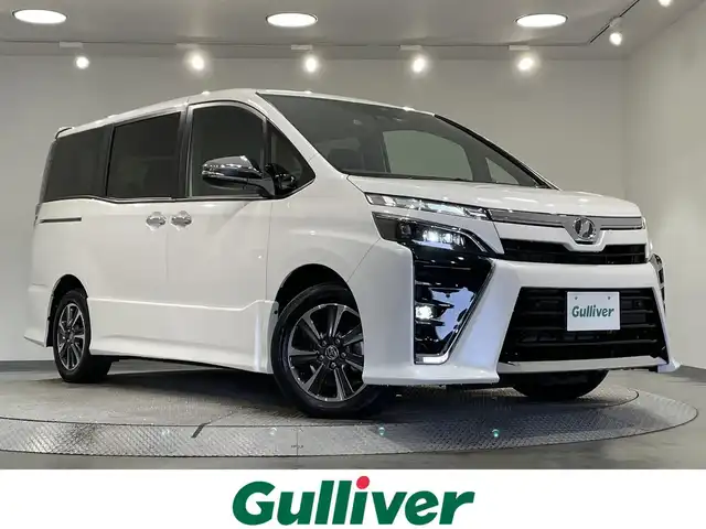 トヨタ ヴォクシー ZS 煌Ⅱ 愛知県 2020(令2)年 4.8万km ホワイトパールクリスタルシャイン AIS評価4.5点/トヨタセーフティセンス/BIGX11インチナビ/（Bluetooth/フルセグTV/HDMI/CD・DVD再生/USB)/バックカメラ/前後ドライブレコーダー/両側パワースライドドア/クルーズコントロール/スマートキー/・プッシュスタート/LEDヘッドライト/・フォグランプ/社外フロアマット/純正アルミホイール/サンシェード/革巻きステアリング/ステアリングスイッチ