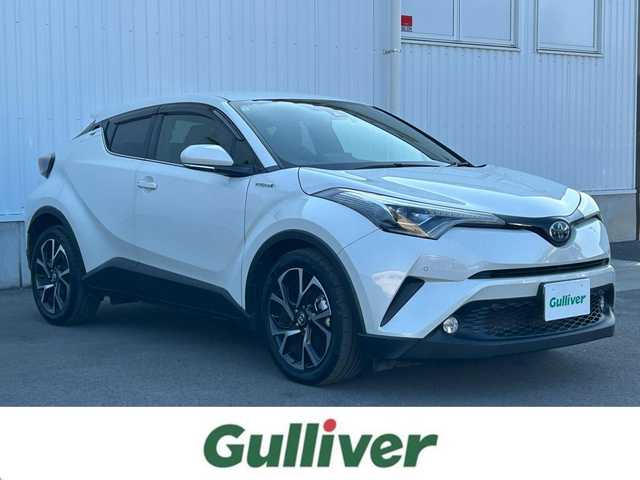 トヨタ Ｃ－ＨＲ G 愛媛県 2017(平29)年 4.9万km ホワイトパールクリスタルシャイン 純正ナビ（Bluetooth/SD/CD/DVD/フルセグTV)/バックカメラ/前方ドライブレコーダー(SD欠)/ビルドインETC/ハーフレザーシート/シートヒーター/アダプティブクルーズコントロール/ブラインドスポットモニター/純正18インチアルミホイール/純正フロアマット/純正ドアバイザー/トノカバー/LEDヘッドライト/フォグランプ/オートマチックハイビーム/オートライト/ABS/横滑り防止装置/レーンキープアシスト/衝突被害軽減ブレーキ/盗難防止装置