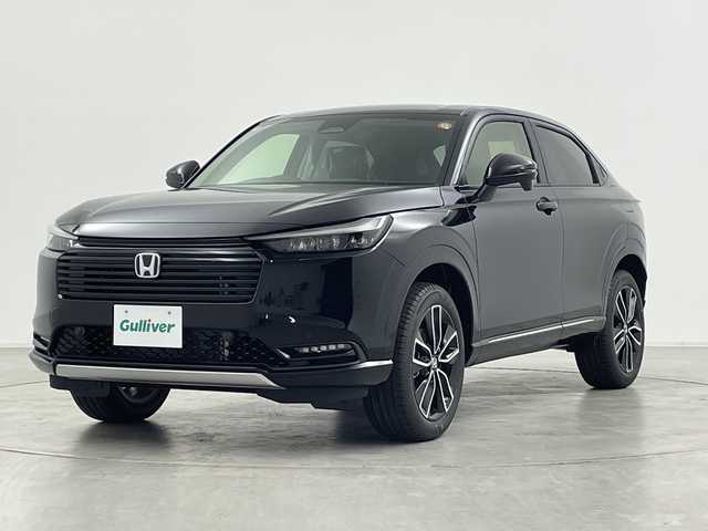 ホンダ ヴェゼル ハイブリッド e:HEV Z 群馬県 2025(令7)年 0.1万km未満 クリスタルブラックパール 登録済未使用車　純正９型ナビ　バックカメラ　ワイヤレス充電器　ＢＳＭ　ハーフレザーシート　シートヒーター　ステアリングヒーター　電動リアゲート　ビルトインＥＴＣ２．０　電動サイドブレーキ　禁煙