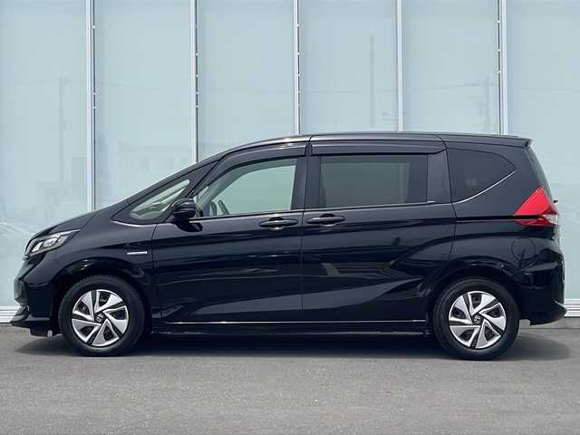 ホンダ フリード ハイブリット G ホンダセンシング 神奈川県 2021(令3)年 6万km クリスタルブラックパール 純正メモリナビ/CD/DVD/Bluetooth/USB/FM/AM/【VXM-224VFi】/フルセグ/両側パワースライドドア/バックカメラ /ホンダセンシング/レーンキープアシスト/追従クルーズコントロール/衝突被害軽減システム/アイドリングストップ/LEDヘッドライト/ドアバイザー/フロアマット/ビルトインETC/プッシュスタート/スマートキー