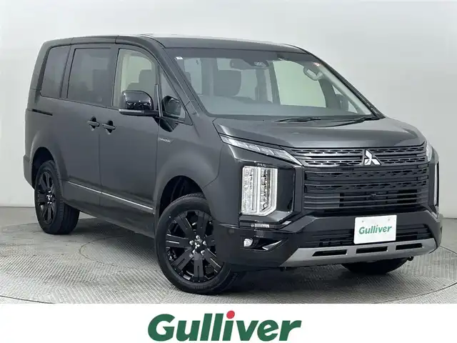 三菱 デリカＤ：５ シャモニー 道央・札幌 2025(令7)年 0.1千km 黒Ⅱ ・登録済み未使用車/・4WD/・寒冷地仕様/・ALPINE製メモリーナビ/・ALPINE製12.8インチフリップダウンモニター/・マルチアラウンドモニター/・自動防眩ミラー/・e-Assist/・衝突被害軽減ブレーキシステム/・レーダークルーズコントロール/・レーンキープアシスト/・横滑り防止装置/・オートブレーキホールド/・ブラインドスポットモニター/・両側パワースライドドア/・パワーバックドア/・アイドリングストップ/・パワーシート/・前席シートヒーター/・ステアリングヒーター/・純正18インチAW/・プッシュスタート/・スマートキー/・スペアキー/・保証書/・取扱説明書