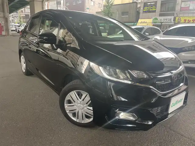 ホンダ フィット 13G L ホンダセンシング 大阪府 2018(平30)年 0.5万km クリスタルブラックパール ホンダセンシング/・安全運転支援システム/・アダプティブクルーズコントロール/・衝突軽減ブレーキ/・誤発進抑制機能/・歩行者事故低減ステアリング/・路外逸脱抑制機能/・車線維持支援システム/・先行車発進お知らせ機能/・標識認識機能/ホンダ純正ナビ/・フルセグTV/・Bluetooth/・バックカメラ/LEDヘッドライト/・オートライト/レーンキープアシスト/プッシュスタート/ワンオーナー/新車保証書/取扱説明書