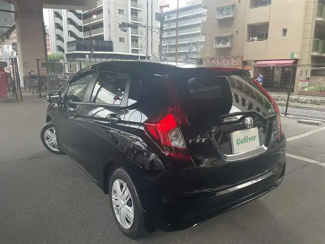 ホンダ フィット 13G L ホンダセンシング 大阪府 2018(平30)年 0.5万km クリスタルブラックパール ホンダセンシング/・安全運転支援システム/・アダプティブクルーズコントロール/・衝突軽減ブレーキ/・誤発進抑制機能/・歩行者事故低減ステアリング/・路外逸脱抑制機能/・車線維持支援システム/・先行車発進お知らせ機能/・標識認識機能/ホンダ純正ナビ/・フルセグTV/・Bluetooth/・バックカメラ/LEDヘッドライト/・オートライト/レーンキープアシスト/プッシュスタート/ワンオーナー/新車保証書/取扱説明書