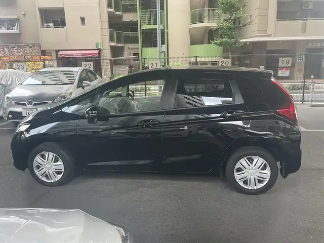 ホンダ フィット 13G L ホンダセンシング 大阪府 2018(平30)年 0.5万km クリスタルブラックパール ホンダセンシング/・安全運転支援システム/・アダプティブクルーズコントロール/・衝突軽減ブレーキ/・誤発進抑制機能/・歩行者事故低減ステアリング/・路外逸脱抑制機能/・車線維持支援システム/・先行車発進お知らせ機能/・標識認識機能/ホンダ純正ナビ/・フルセグTV/・Bluetooth/・バックカメラ/LEDヘッドライト/・オートライト/レーンキープアシスト/プッシュスタート/ワンオーナー/新車保証書/取扱説明書