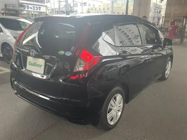ホンダ フィット 13G L ホンダセンシング 大阪府 2018(平30)年 0.5万km クリスタルブラックパール ホンダセンシング/・安全運転支援システム/・アダプティブクルーズコントロール/・衝突軽減ブレーキ/・誤発進抑制機能/・歩行者事故低減ステアリング/・路外逸脱抑制機能/・車線維持支援システム/・先行車発進お知らせ機能/・標識認識機能/ホンダ純正ナビ/・フルセグTV/・Bluetooth/・バックカメラ/LEDヘッドライト/・オートライト/レーンキープアシスト/プッシュスタート/ワンオーナー/新車保証書/取扱説明書