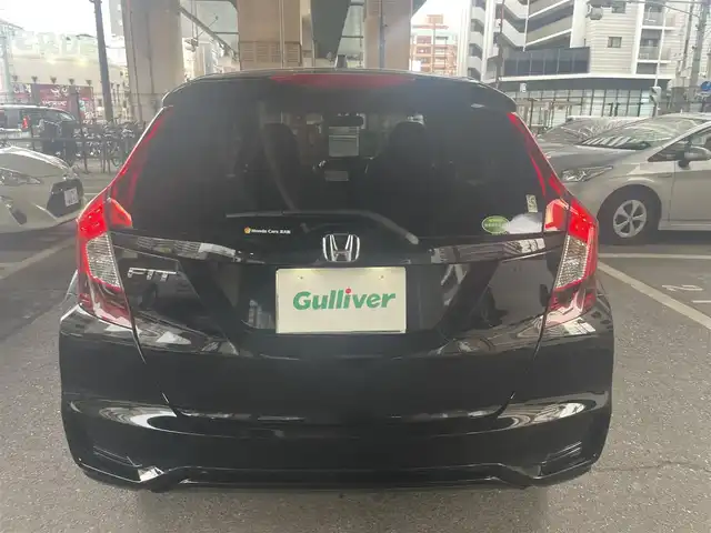 ホンダ フィット 13G L ホンダセンシング 大阪府 2018(平30)年 0.5万km クリスタルブラックパール ホンダセンシング/・安全運転支援システム/・アダプティブクルーズコントロール/・衝突軽減ブレーキ/・誤発進抑制機能/・歩行者事故低減ステアリング/・路外逸脱抑制機能/・車線維持支援システム/・先行車発進お知らせ機能/・標識認識機能/ホンダ純正ナビ/・フルセグTV/・Bluetooth/・バックカメラ/LEDヘッドライト/・オートライト/レーンキープアシスト/プッシュスタート/ワンオーナー/新車保証書/取扱説明書