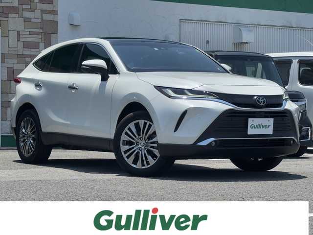 トヨタ ハリアー Z 徳島県 2022(令4)年 0.7万km ホワイトパールクリスタルシャイン 純正JBLナビ　/　AM/FM/BT/USB/フルセグ/Miracast/バックカメラ/全周囲カメラ/ビルトインETC2.0/OP調光パノラマルーフ/ハーフレザーシート/デジタルインナーミラー/ドライブレコーダー/運転席パワーシート/クルーズコントロール/純正フロアマット/パワーバックドア/ブラインドスポットモニター/クリアランスソナー/プッシュスタート/スマートキー/コーナーセンサー/本革巻きステアリング/フォグライト/オートライト/LEDヘッドライト/オートブレーキホールド