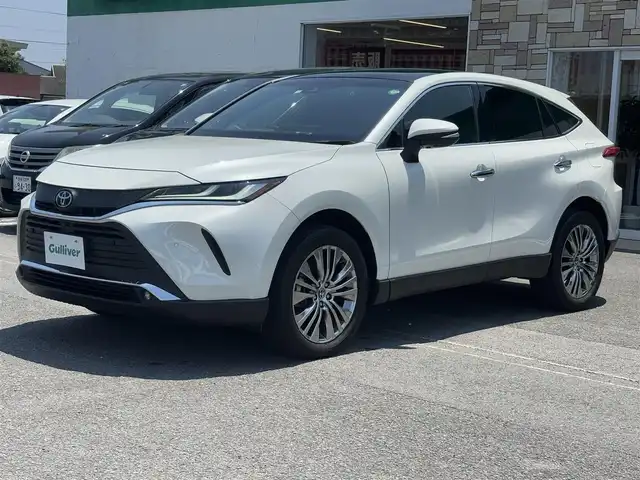 トヨタ ハリアー Z 徳島県 2022(令4)年 0.7万km ホワイトパールクリスタルシャイン 純正JBLナビ　/　AM/FM/BT/USB/フルセグ/Miracast/バックカメラ/全周囲カメラ/ビルトインETC2.0/OP調光パノラマルーフ/ハーフレザーシート/デジタルインナーミラー/ドライブレコーダー/運転席パワーシート/クルーズコントロール/純正フロアマット/パワーバックドア/ブラインドスポットモニター/クリアランスソナー/プッシュスタート/スマートキー/コーナーセンサー/本革巻きステアリング/フォグライト/オートライト/LEDヘッドライト/オートブレーキホールド