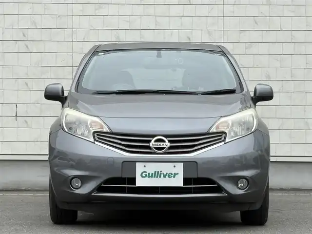 日産 ノート X FOUR 岩手県 2013(平25)年 5.4万km ダークメタルグレー 禁煙車/4WD（切替）/純正エンジンスターター/純正ナビ/→フルセグTV/Bluetooth/CD/DVD/FM/AM/フォグライト/〇プッシュスタート/〇電動格納ミラー/〇シガーソケット/〇ドアバイザー/〇フロアマット/〇スマートキー/スペアキー/前後ドライブレコーダー/冬タイヤ社外アルミホイール車載