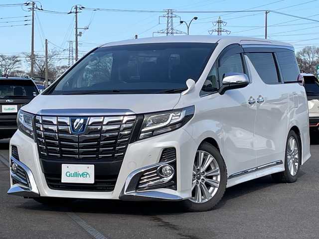 トヨタ アルファード SA 道央・札幌 2015(平27)年 2万km ホワイトパールクリスタルシャイン ４WD/寒冷地仕様/ローダウン/純正ディーラーOPナビ/CD/DVD/BT/フルセグ/純正フリップダウンモニター/横滑り防止装置/クルーズコントロール/クリアランスソナー/バックカメラ/ビルトインETC/ECOMODE/nanoe/ワイパーデアイサー/両側パワースライドドア/N席/２列目オットマン/革巻きステアリング/ステアリングリモコン/電動パーキング/ブレーキホールド/MTモード付AT/プッシュスタート/スマートキー/LEDヘッドライト/オートライト/フォグランプ/電動格納ミラー/ウィンカーミラー/純正フロアマット/ドアバイザー/社外エンジンスターター