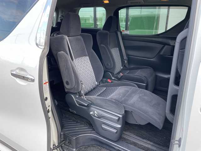 トヨタ アルファード SA 道央・札幌 2015(平27)年 2万km ホワイトパールクリスタルシャイン ４WD/寒冷地仕様/ローダウン/純正ディーラーOPナビ/CD/DVD/BT/フルセグ/純正フリップダウンモニター/横滑り防止装置/クルーズコントロール/クリアランスソナー/バックカメラ/ビルトインETC/ECOMODE/nanoe/ワイパーデアイサー/両側パワースライドドア/N席/２列目オットマン/革巻きステアリング/ステアリングリモコン/電動パーキング/ブレーキホールド/MTモード付AT/プッシュスタート/スマートキー/LEDヘッドライト/オートライト/フォグランプ/電動格納ミラー/ウィンカーミラー/純正フロアマット/ドアバイザー/社外エンジンスターター