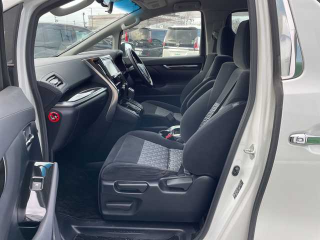 トヨタ アルファード SA 道央・札幌 2015(平27)年 2万km ホワイトパールクリスタルシャイン ４WD/寒冷地仕様/ローダウン/純正ディーラーOPナビ/CD/DVD/BT/フルセグ/純正フリップダウンモニター/横滑り防止装置/クルーズコントロール/クリアランスソナー/バックカメラ/ビルトインETC/ECOMODE/nanoe/ワイパーデアイサー/両側パワースライドドア/N席/２列目オットマン/革巻きステアリング/ステアリングリモコン/電動パーキング/ブレーキホールド/MTモード付AT/プッシュスタート/スマートキー/LEDヘッドライト/オートライト/フォグランプ/電動格納ミラー/ウィンカーミラー/純正フロアマット/ドアバイザー/社外エンジンスターター