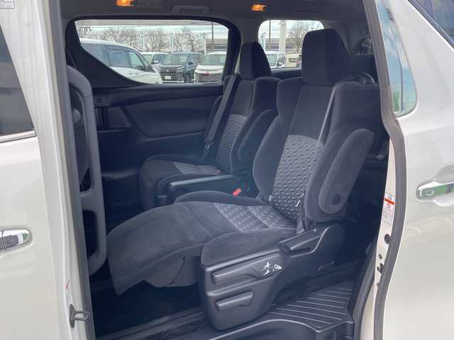 トヨタ アルファード SA 道央・札幌 2015(平27)年 2万km ホワイトパールクリスタルシャイン ４WD/寒冷地仕様/ローダウン/純正ディーラーOPナビ/CD/DVD/BT/フルセグ/純正フリップダウンモニター/横滑り防止装置/クルーズコントロール/クリアランスソナー/バックカメラ/ビルトインETC/ECOMODE/nanoe/ワイパーデアイサー/両側パワースライドドア/N席/２列目オットマン/革巻きステアリング/ステアリングリモコン/電動パーキング/ブレーキホールド/MTモード付AT/プッシュスタート/スマートキー/LEDヘッドライト/オートライト/フォグランプ/電動格納ミラー/ウィンカーミラー/純正フロアマット/ドアバイザー/社外エンジンスターター