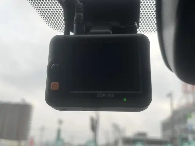 トヨタ ノア ハイブリッド S－Z 島根県 2025(令7)年 0.7万km ホワイトパールクリスタルシャイン モデリスタエアロ/フリップダウンモニター/純正１０型ＳＤナビ　/フルセグTV　/ＤＶＤ再生　/Ｂｌｕｅｔｏｏｔｈ接続　/両側パワースライドドア　/バックカメラ　/ビルトインＥＴＣ2.0/前後ドライブレーダー/レーダークルーズコントロール/衝突軽減ブレーキ/ヘッドアップディスプレイ/パワーバックドア　/前後コーナーセンサー/前席・２列目シートヒーター　/ホワイトレザー調シートカバー/ステアリングヒーター/オートハイビーム／ライト/スマートキー／プッシュスタート/純正LEDヘッドライト/純正１７インチアルミホイール/保証書/取扱説明書/スペアキー1本