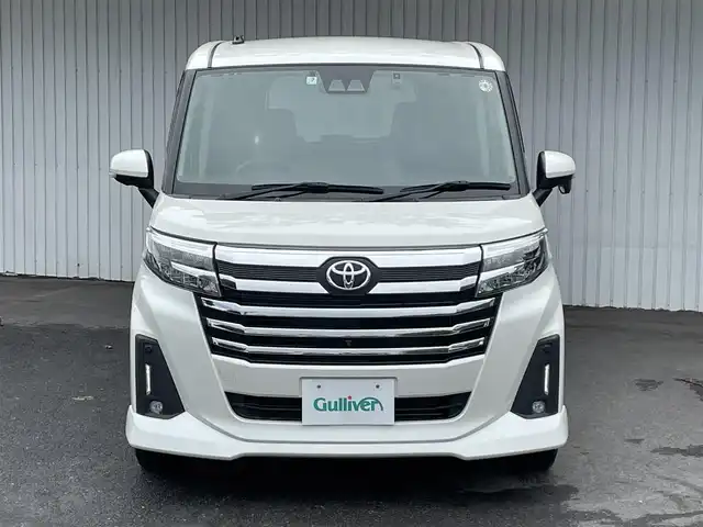 トヨタ ルーミー カスタムG 神奈川県 2021(令3)年 2.3万km パールホワイトⅢ スマートアシスト/両側パワースライドドア/12型フリップダウンモニター/純正メモリナビ(型式：NSZT-W68T)/・CD/DVD/Bluetooth/フルセグテレビ/全方位カメラ/ビルトインETC/ドライブレコーダー/レーダークルーズコントロール/社外17インチAW/前後コーナーセンサー/LEDヘッドライト/プッシュスタート/スマートキー/スペアキー1本/純正フロアマット/取扱説明書/保証書