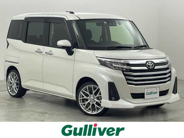 トヨタ ルーミー カスタムG 福岡県 2021(令3)年 2.3万km パールホワイトⅢ 後席モニター　/純正ナビ（ＢＴ，フルセグＴＶ）　/全方位カメラ　/ビルトインＥＴＣ　/前方ドライブレコーダー　/ＡＣＣ　/コーナーセンサー　/衝突軽減ブレーキ　/レーンキープ　/両側電動スライドドア/純正１７インチＡＷ