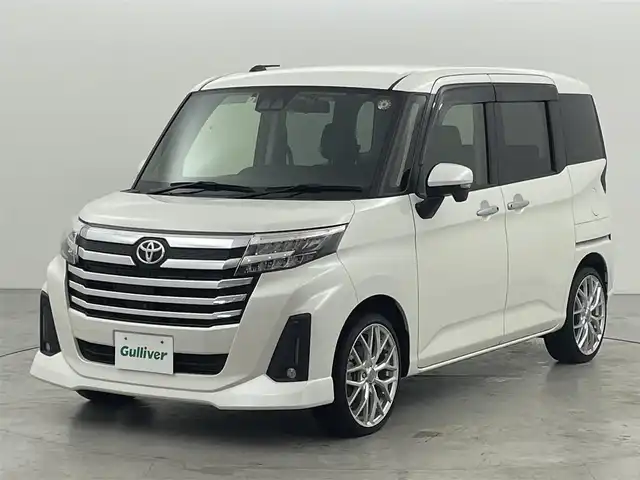 トヨタ ルーミー カスタムG 福岡県 2021(令3)年 2.3万km パールホワイトⅢ 後席モニター　/純正ナビ（ＢＴ，フルセグＴＶ）　/全方位カメラ　/ビルトインＥＴＣ　/前方ドライブレコーダー　/ＡＣＣ　/コーナーセンサー　/衝突軽減ブレーキ　/レーンキープ　/両側電動スライドドア/純正１７インチＡＷ