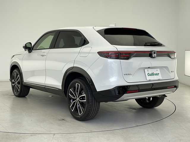 ホンダ ヴェゼル ハイブリッド e:HEV Z 千葉県 2025(令7)年 0.1万km未満 プラチナホワイトパール ホンダセンシング/（衝突軽減ブレーキ　レーンキープアシスト　レーダークルーズコントロール　誤発進抑制機能　先行車発進お知らせ　標識認識機能　オートマチックハイビーム）/純正メモリナビ/（フルセグ/Bluetooth/USB/FM/AM）/バックカメラ/ステアリングスイッチ/ステアリングヒーター/ビルトインETC2.0/アイドリングストップ/ブラインドスポットモニター/レザーシート/シートヒーター/（運転席＋助手席）/スマートキー/プッシュスタート/LEDヘッドライト/フォグライト/電動格納ミラー/W＋サイド＋カーテンエアバッグ/パドルシフト/ワイヤレス充電/純正18インチアルミホイール