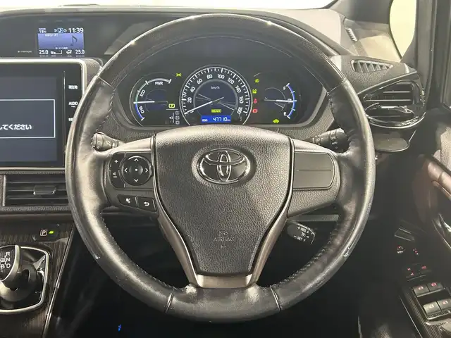 トヨタ エスクァイア ハイブリッド Gi プレミアムパッケージ 愛知県 2018(平30)年 4.8万km ブラック 純正１０インチＴコネクトナビ　/(Bluetooth/フルセグTV/SD/HDMI/AM/FM/CD・DVD再生)/モデリスタエアロ(F/S/R)/純正フリップダウンモニター　/両側パワースライドドア　/１００Ｖ電源　/トヨタセーフティセンスC　/　　-プリクラッシュセーフティ/　　-レーンディパーチャーアラート（LDA)/　　-オートマチックハイビーム/シートヒーター　/ビルトインＥＴＣ２．０　　/ＬＥＤヘッドライト/バックカメラ/ドライブレコーダー/ステアリングヒーター/オートクルーズコントロール/LEDフォグ/半革シート