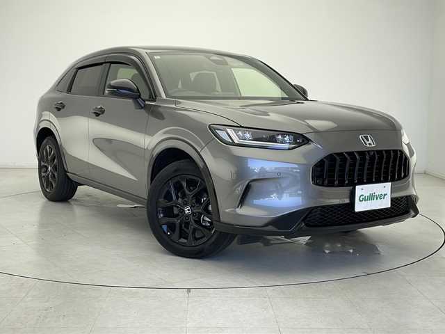 ホンダ ＺＲ－Ｖ ハイブリッド e:HEV Z ブラックスタイル 千葉県 2024(令6)年 0.4万km スーパープラチナグレーメタリック ホンダセンシング/衝突軽減ブレーキ/レーンキープアシスト/レーダークルーズコントロール/踏み間違い防止/クリアランスソナー/ブラインドスポットモニター/後退出庫サポート/BOSEサウンド/純正ディスプレイナビ/フルセグ/BT/USB/カープレイ/全方位カメラ/革巻きステアリング/ステアリングスイッチ/ステアリングヒーター/ETC2.0/ワイヤレス充電/ハンズフリーパワーバックドア/レザーシート/シートヒーター(D/N席)/パワーシート(D/N席)/シートメモリ/スマートキー/プッシュスタート/LEDヘッドライト/オートライト/アダプティブヘッドライト/電動格納/ウィンカーミラー/取り扱い説明書/保証書