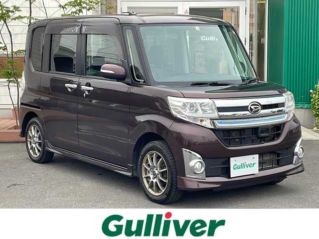 ダイハツ タント カスタム RS SA 青森県 2014(平26)年 10.8万km プラムブラウンクリスタルマイカ 4WD・ターボ/社外HDDナビ・フルセグTV/バックカメラ/両側パワースライドドア/スマートアシスト/衝突軽減ブレーキ/横滑り防止機能/エコアイドル/プッシュスタート/スマートキー/LEDランプ/フォグランプ/社外14インチアルミ