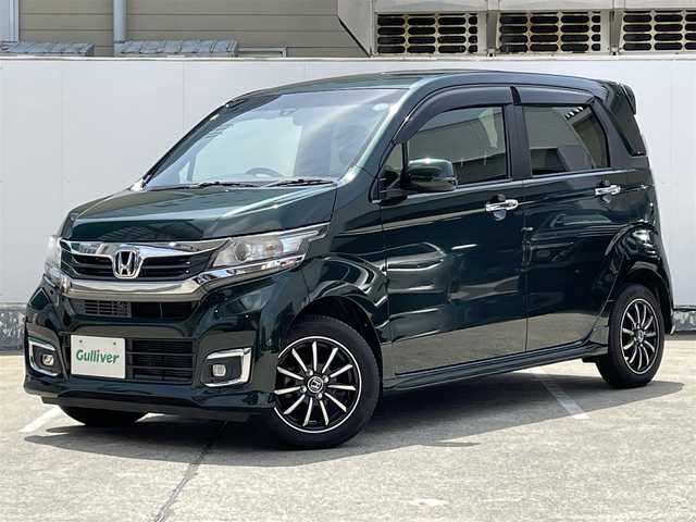 ホンダ Ｎ ＷＧＮ カスタムGSSパッケージⅡ 青森県 2018(平30)年 3.8万km ブリティッシュグリーンP 4WD/ワンオーナー/ディーラー定期点検８回/ETC/純正ナビ/・ワンセグTV/・CD/・FM・AM/・Bluetooth/・USB/・HDMI/純正スターター/ドライブレコーダー/クルーズコントロール/ステアリングリモコン/シートヒーター/オートライト/オートマチックハイビーム/純正タイヤ/社外スタットレスタイヤ積込/USBポート２個/純正ドアバイザー/純正フロアマット/電格ミラー/取扱説明書/保証書