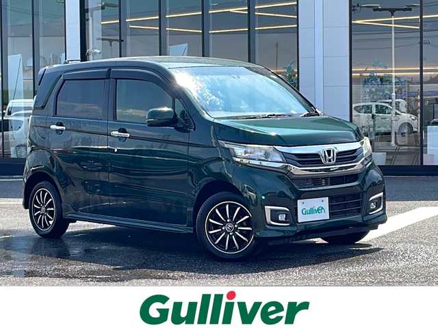 ホンダ Ｎ ＷＧＮ カスタムGSSパッケージⅡ 新潟県 2018(平30)年 3.8万km ブリティッシュグリーンP ワンオーナー/4WD/社外ナビ/（BT／AM／FM／DVD）/ワンセグTV/USB2個/HDMI/シートヒーター（運転席＋助手席）/エアシート（運転席＋助手席）/純正エンジンスターター/ドライブレコーダー/ビルトインETC/クルーズコントロール/ステアリングスイッチ/オートライト/オートマチックハイビーム/社外スタットレスタイヤ積込/純正ドアバイザー/純正フロアマット/電動自動格納ミラー/取扱説明書/保証書