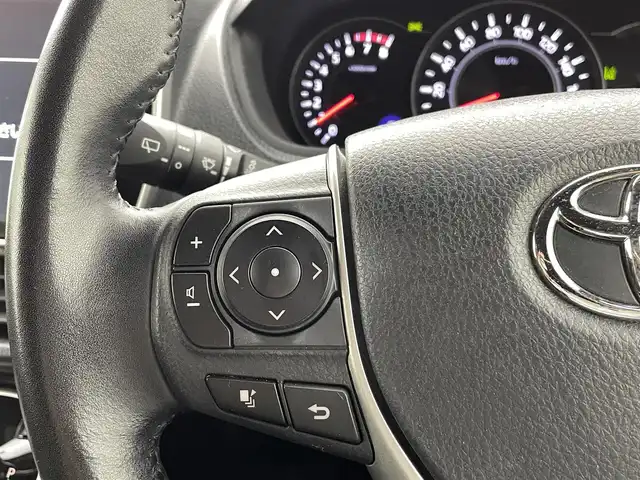トヨタ ヴォクシー ZS 煌 熊本県 2018(平30)年 7万km ブラッキッシュアゲハガラスフレーク 純正10インチナビ（ＣＤ・ＤＶＤ・フルセグ・ＢＴ・ＳＤ・HDMI）/純正フリップダウンモニター/バックカメラ　/社外前後ドライブレコーダー　/ビルトインＥＴＣ　/両側パワースライドドア　/トヨタセーフティーセンス/・プリクラッシュセーフティ/・先行車発進お知らせ機能/・レーンキープアシスト/・クルーズコントロール/・レーンディパーチャーアラート/・オートマチックハイビーム/横滑り防止/アイドリングストップ/純正フロアマット/純正１６インチAW/オートライト/LEDヘッドライト/フォグライト/スマートキー/プッシュスタート