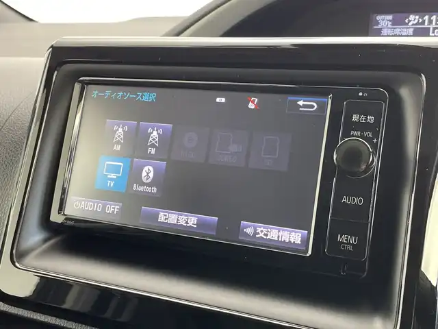 トヨタ ヴォクシー ZS 煌Ⅱ 新潟県 2016(平28)年 6.6万km ブラック 純正ディーラーＯＰナビ/フリップダウンモニター/プリクラッシュセーフティ/車線逸脱警報システム/ＥＴＣ/前後ドライブレコーダー/両側パワースライドドア/オートライト/オートハイビーム/ＬＥＤヘッドライト/フォグランプ/アイドリングストップ/プッシュスタート/純正16インチアルミホイール/フロアマット