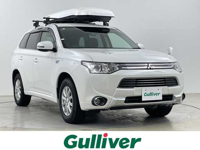 三菱 アウトランダー ＰＨＥＶ G セーフティパッケージ 道央・札幌 2014(平26)年 2.7万km シルキーホワイト ・４WD/プラグインハイブリッド/・レーダークルーズコントロール/・DIATONEナビ/・DVD.CD.SD.フルセグ/・Bluetooth./・バックカメラ/・ハーフレザーシート/・運転席/助手席シートヒーター/・ドライブレコーダー/・ルーフボックス/・LDW/・パドルシフト/・ホイール積み込み/・充電ケーブル