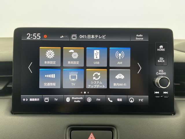 ホンダ ヴェゼル ハイブリッド e:HEV Z 栃木県 2025(令7)年 0.1千km プラチナホワイトパール 登録済未使用車/Honda CONNECTディスプレイオーディオ（ナビ付）/（フルセグ／Bluetooth／AppleCarPley／　　AndroidAuto）/バックカメラ/ホンダセンシング/・衝突軽減ブレーキ/・レーンキープアシスト/・レーダークルーズコントロール/・前後コーナーセンサー/・オートハイビーム/・ブラインドスポットモニター/・標識認識機能/・先行車発進機能/シーケンシャルウィンカー/電動リアゲート/ビルトインETC2.0/前席シートヒーター/ステアリングヒーター/ステアリングスイッチ/パドルシフト/オートLEDヘッドライト/フォグランプ/置くだけ充電/電動ホールド/スマートキー（スペア1本）