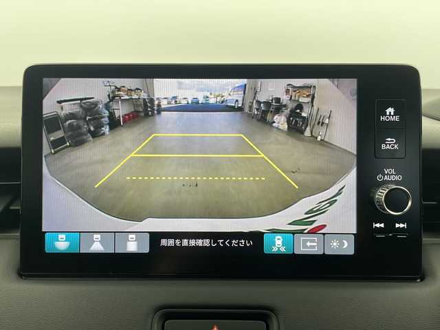 ホンダ ヴェゼル ハイブリッド e:HEV Z 栃木県 2025(令7)年 0.1千km プラチナホワイトパール 登録済未使用車/Honda CONNECTディスプレイオーディオ（ナビ付）/（フルセグ／Bluetooth／AppleCarPley／　　AndroidAuto）/バックカメラ/ホンダセンシング/・衝突軽減ブレーキ/・レーンキープアシスト/・レーダークルーズコントロール/・前後コーナーセンサー/・オートハイビーム/・ブラインドスポットモニター/・標識認識機能/・先行車発進機能/シーケンシャルウィンカー/電動リアゲート/ビルトインETC2.0/前席シートヒーター/ステアリングヒーター/ステアリングスイッチ/パドルシフト/オートLEDヘッドライト/フォグランプ/置くだけ充電/電動ホールド/スマートキー（スペア1本）