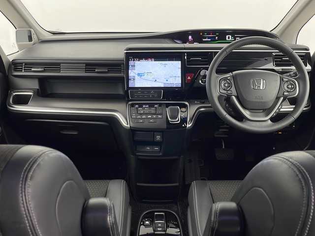 ホンダ ステップワゴン スパーダ eHEV G EXホンダS 埼玉県 2021(令3)年 4.9万km プラチナホワイトパール 後席モニター/純正ナビ　/バックカメラ　/ビルトインＥＴＣ２．０　/前後ドライブレコーダー　/両側パワースライドドア　/ブレードホールド　/シートヒーター　/衝突軽減システム　/レーダークルーズコントロール　/レーンキープアシスト/LEDヘッドライト/ロールサンシェード/純正アルミホイール/純正フロアマット/ＨＤＭＩ